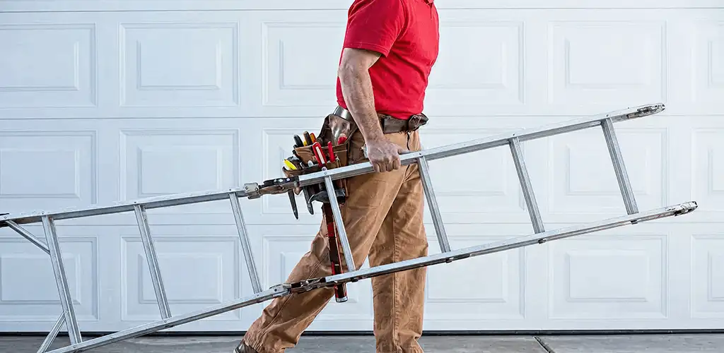 Garage door repair technician arriving with tools and ladder in Sacramento, CA